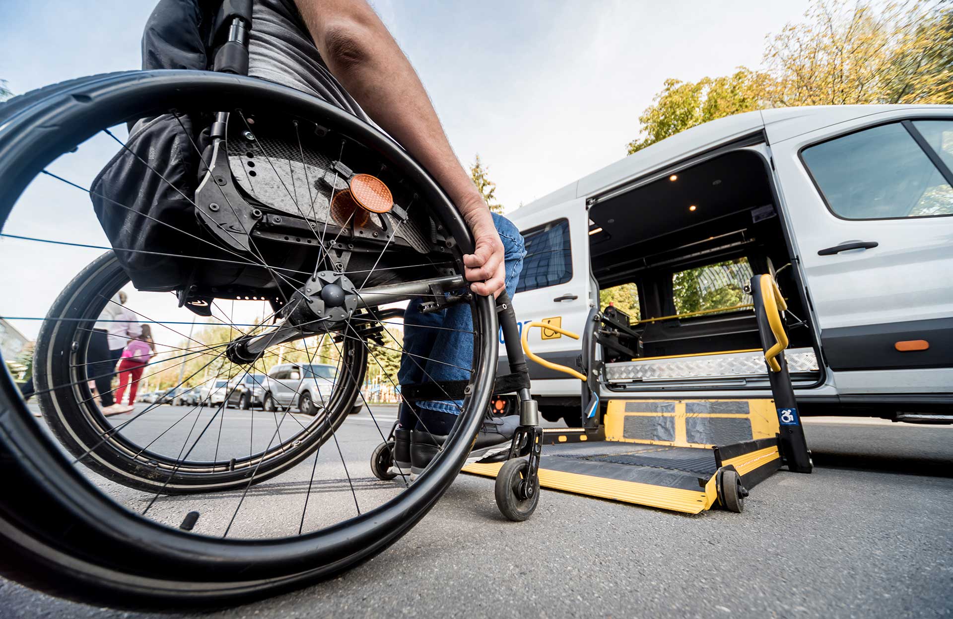 Man with restricted mobility entering vehicle